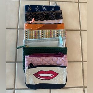 8 Ipsy make up bags assorted